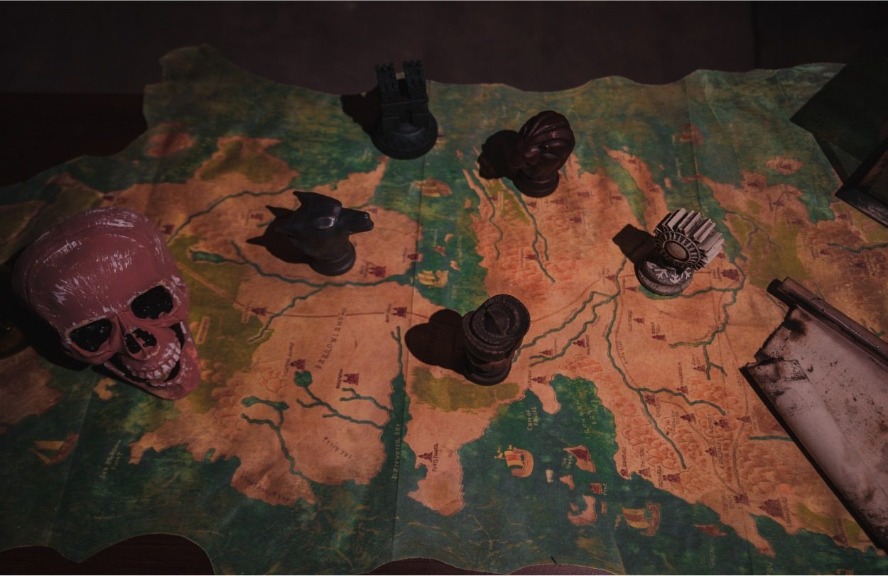 Carte au trésor, crâne et bougies : décor d'escape game Game Over à Genève